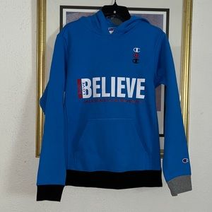 Blue champion hoodie, with Believe Thee I Love Jackson State university,